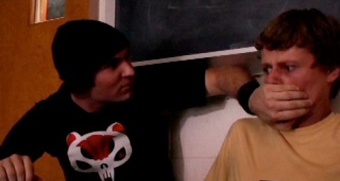 Dennis (Lance Hendrickson) stops Charles from questioning events.