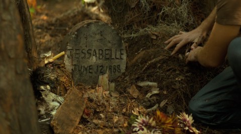 A grave marked with Jessabelle's birthday.
