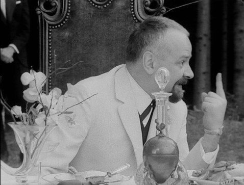 The Host complains that there should be an extra chair if a guest left.