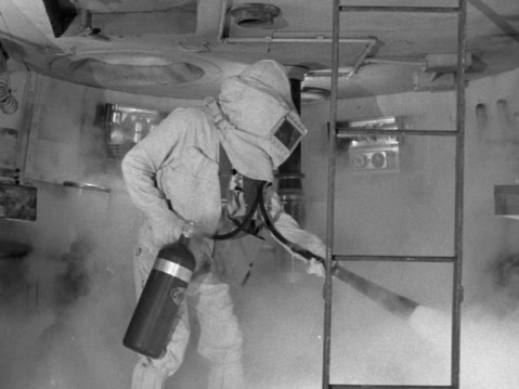 It's not a 1950s space movie until someone has to put out a fire.